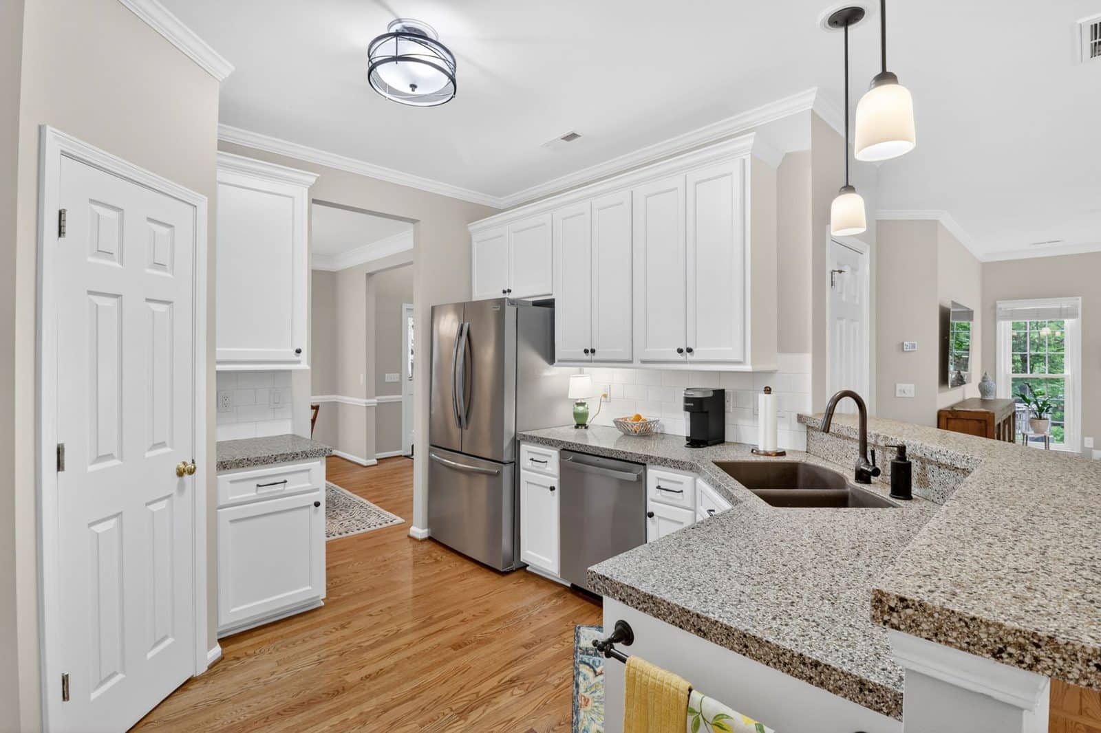 Updated kitchen with granite countertops and stainless appliances