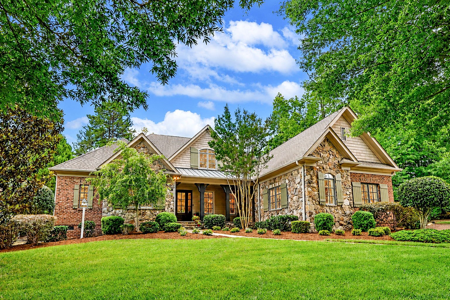 Front exterior of 508 Hideaway Ridge Court, 5-bed 5-bath custom home in Matthews NC