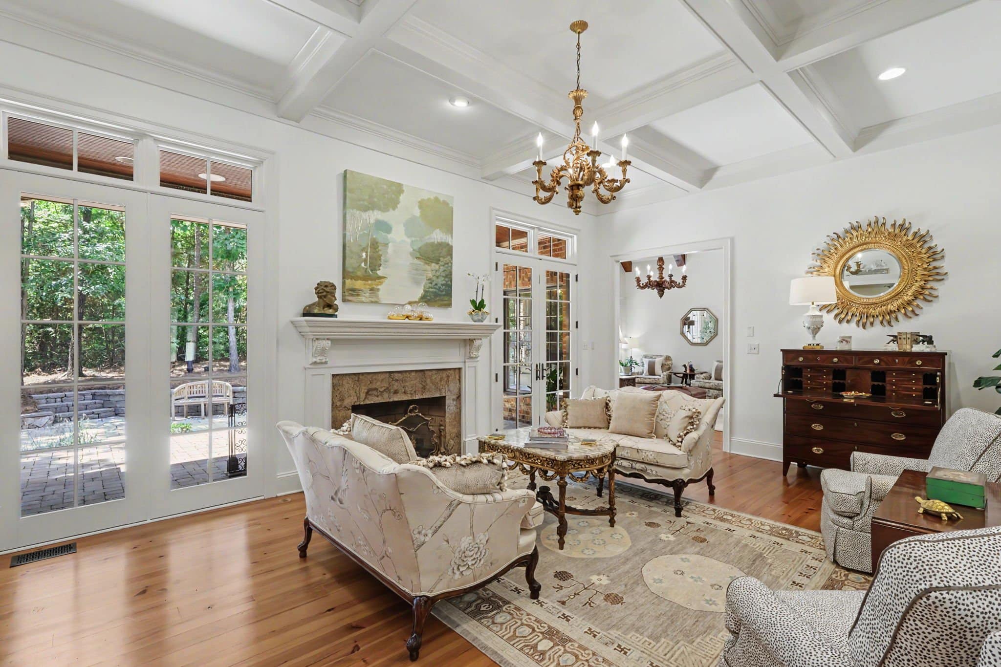 Coffered ceiling and masonry fireplace in a custom home in The Forest Matthews